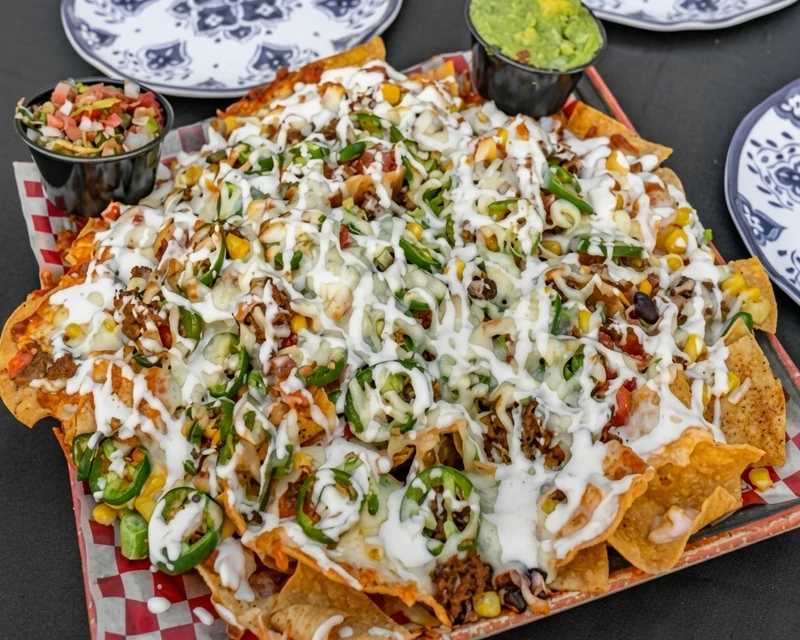 Loaded nachos with melted cheese, jalapenos and salsa to share at Habaneros Mexican Grill, downtown Leduc